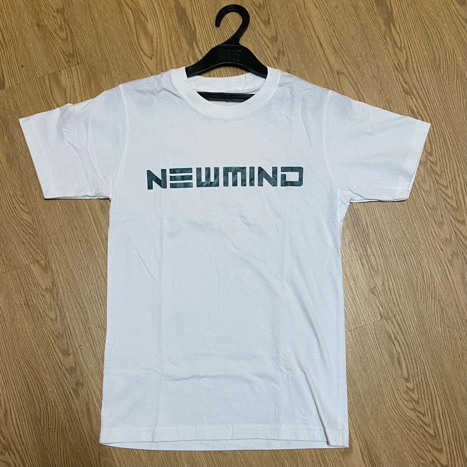 BAJU KAOS NEWMIND PUTIH SIZE S